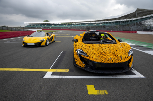 Lando Norris takes on Silverstone circuit in a life-size Lego technic McLaren P1.