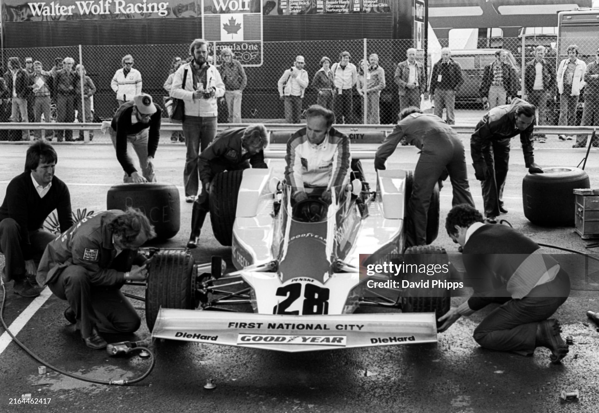 Penske mechanics practice tyre changing pit stops on the PC4 of John Watson, who would crash out on the opening lap of the race when his throttle stuck open, at the Grand Prix of Sweden in Anderstorp on 13 June 1976. 
