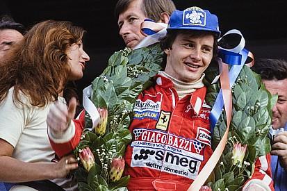 Gilles Villeneuve on the podium with his wife.