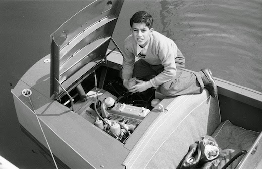 Alexander Onassis looking at the engine of one of the ‘Christina’ yacht small motorboat - he liked everything that have an engine!!!