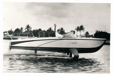 A speedboat / hydrofoil in action.