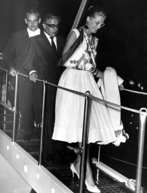 Rainier III of Monaco, Aristotle Onassis and Grace Kelly disembarking from the ‘Christina’.