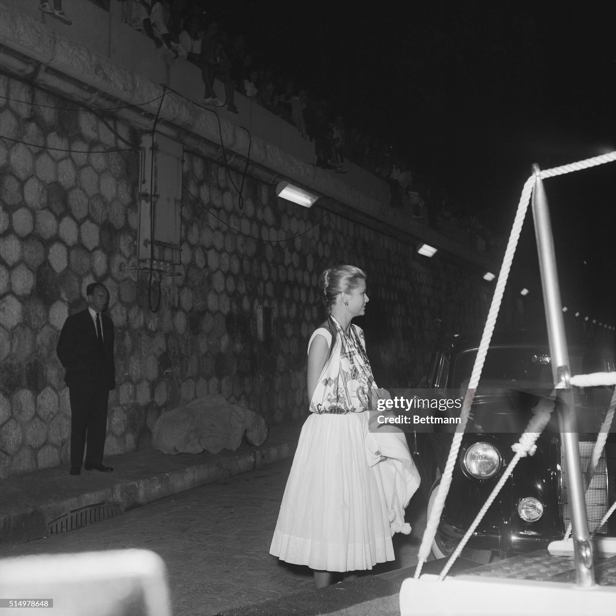 Actress Grace Kelly — who married Prince Rainier III of Monaco — boards the Christina for a 10-day Mediterranean cruise. 