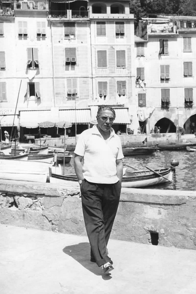 Aristotle Onassis strolling the canals of Italy in 1955. 