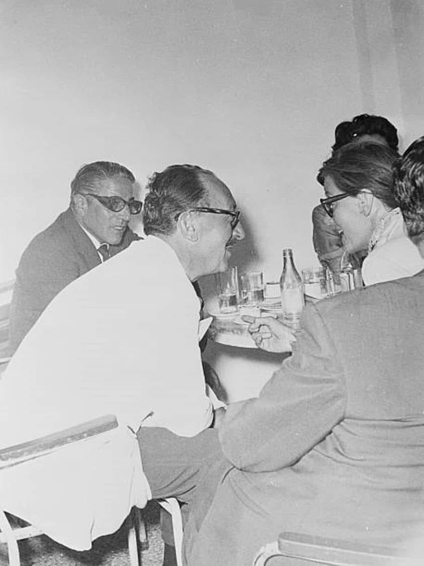 Greta Garbo and some friends in an Athens cafe are seen chatting animatedly on 01 September 1955. At left is Greek multimillionaire ship owner Aristotle Onassis. The others are unidentified.