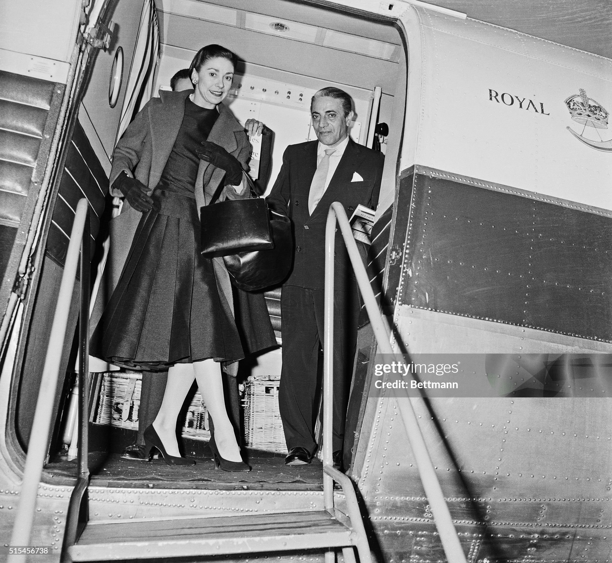 World famous ballerina Margot Fonteyn is accompanied by Greek ship owner Aristotle Socrates Onassis, as she steps from a chartered plane upon arriving in Nice from London on 25 January 1956. They were on the way to Monte Carlo. 