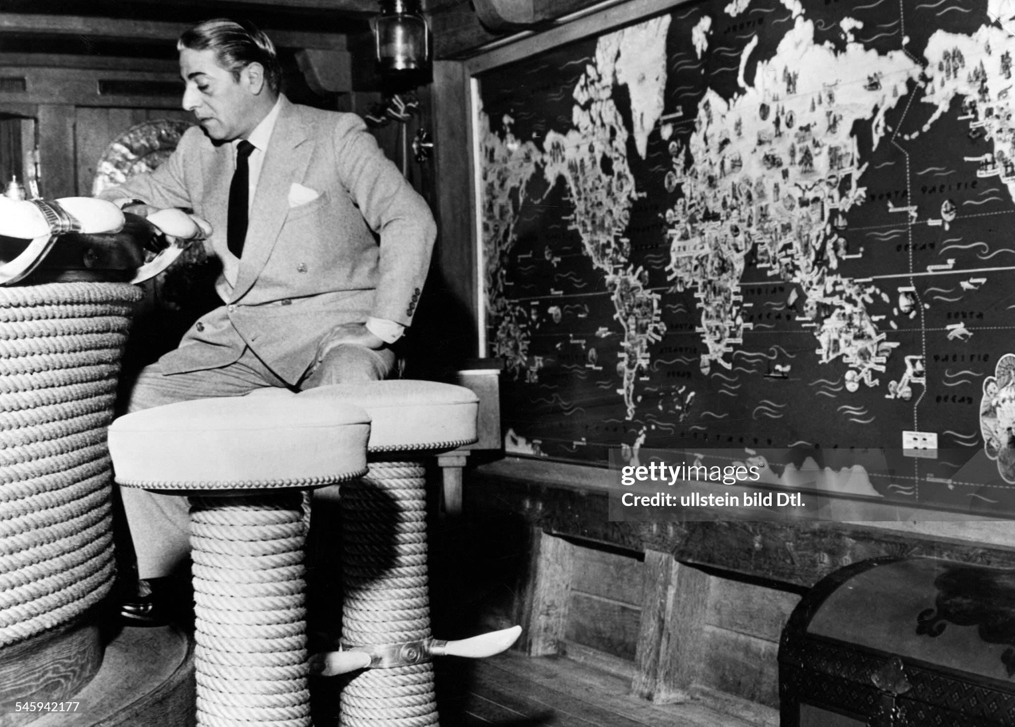 Aristotle Onassis in the bar of his luxury yacht ‘Christina’ on 01 March 1956. 