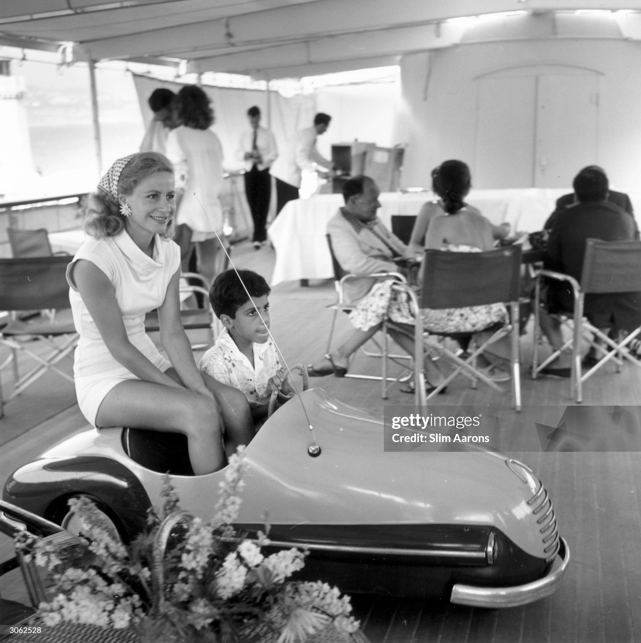 Athina (Tina) Livanos, first wife of shipping magnate Aristotle Socrates Onassis, on board Aristotle's yacht 'Christina' with her son Alexander (1948 - 1973) in Monte Carlo in 1956. 