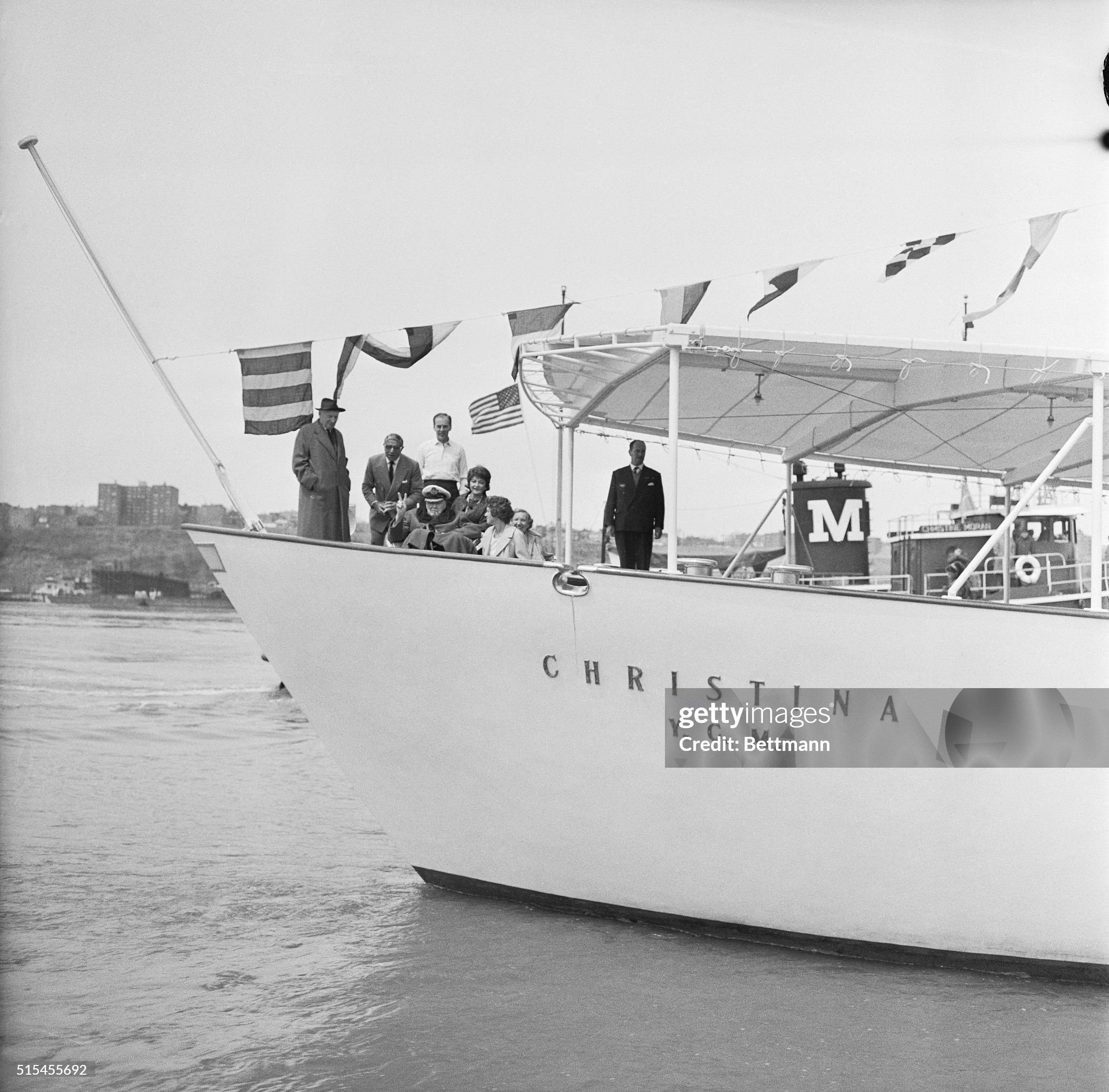 Winston Churchill and Aristotle Onassis arriving on Christina. 