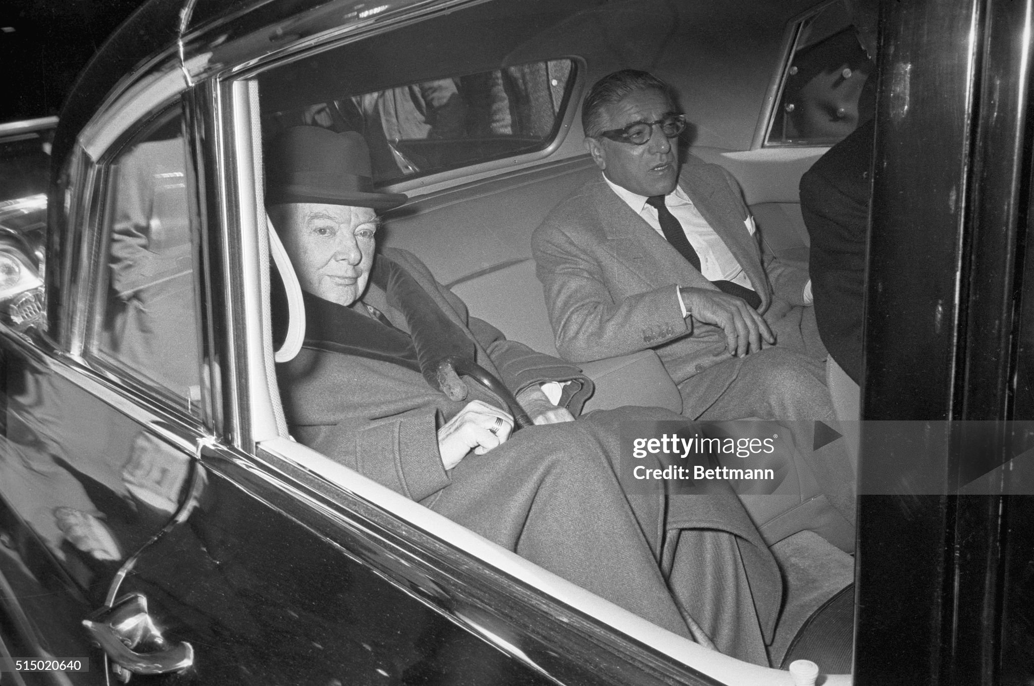 Greek shipping magnate Aristotle Socrates Onassis chats with his guest, Sir Winston Churchill, on 14 April 1961, as he accompanies Sir Winston to the airport in New York, where he was to fly back to England. Churchill was cruising with Onassis aboard his yacht ‘Christina’, which was currently docked in New York.