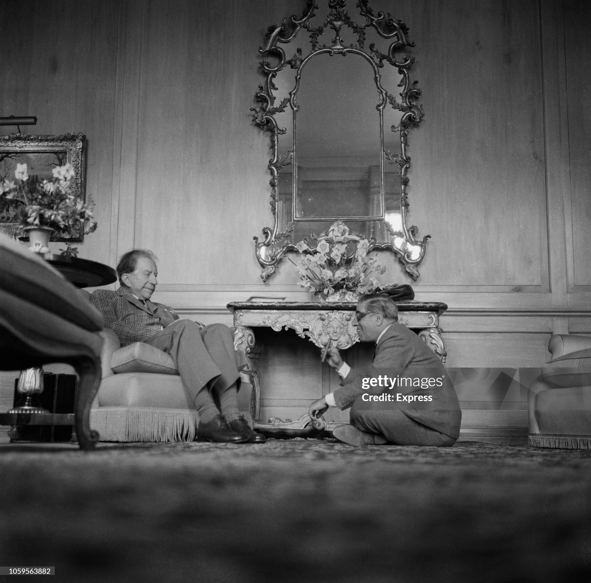 American industrialist and founder of Getty Oil, Jean Paul Getty (1892-1976), pictured with Aristotle Onassis at Sutton Place manor house in Surrey, England, in March 1963. 