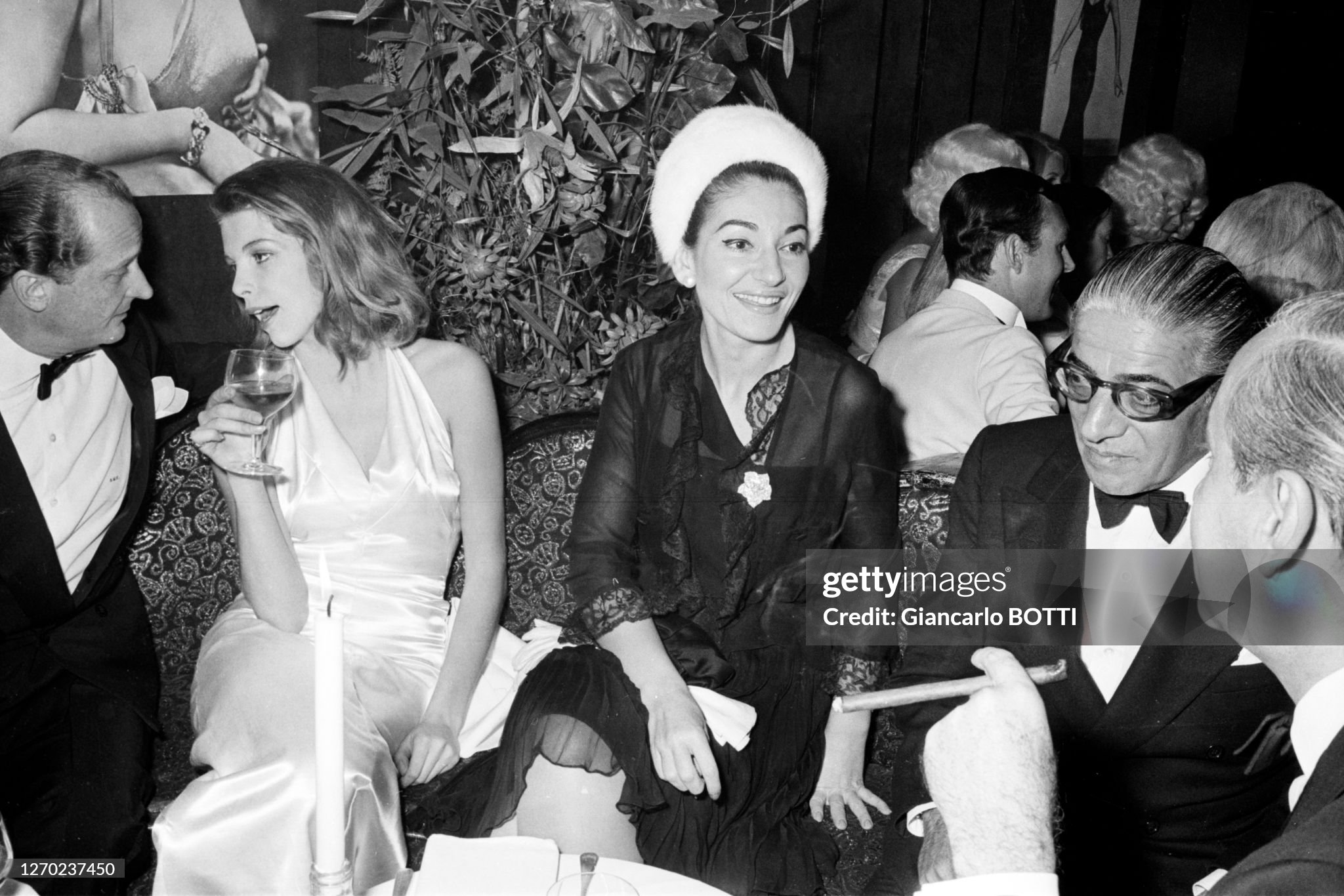 Maria Callas and Aristotle Onassis at a party in tribute to Jean Harlow at New Jimmy's in Paris on 29 March 1965.
