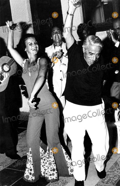 Aristotle Onassis dancing with a woman.