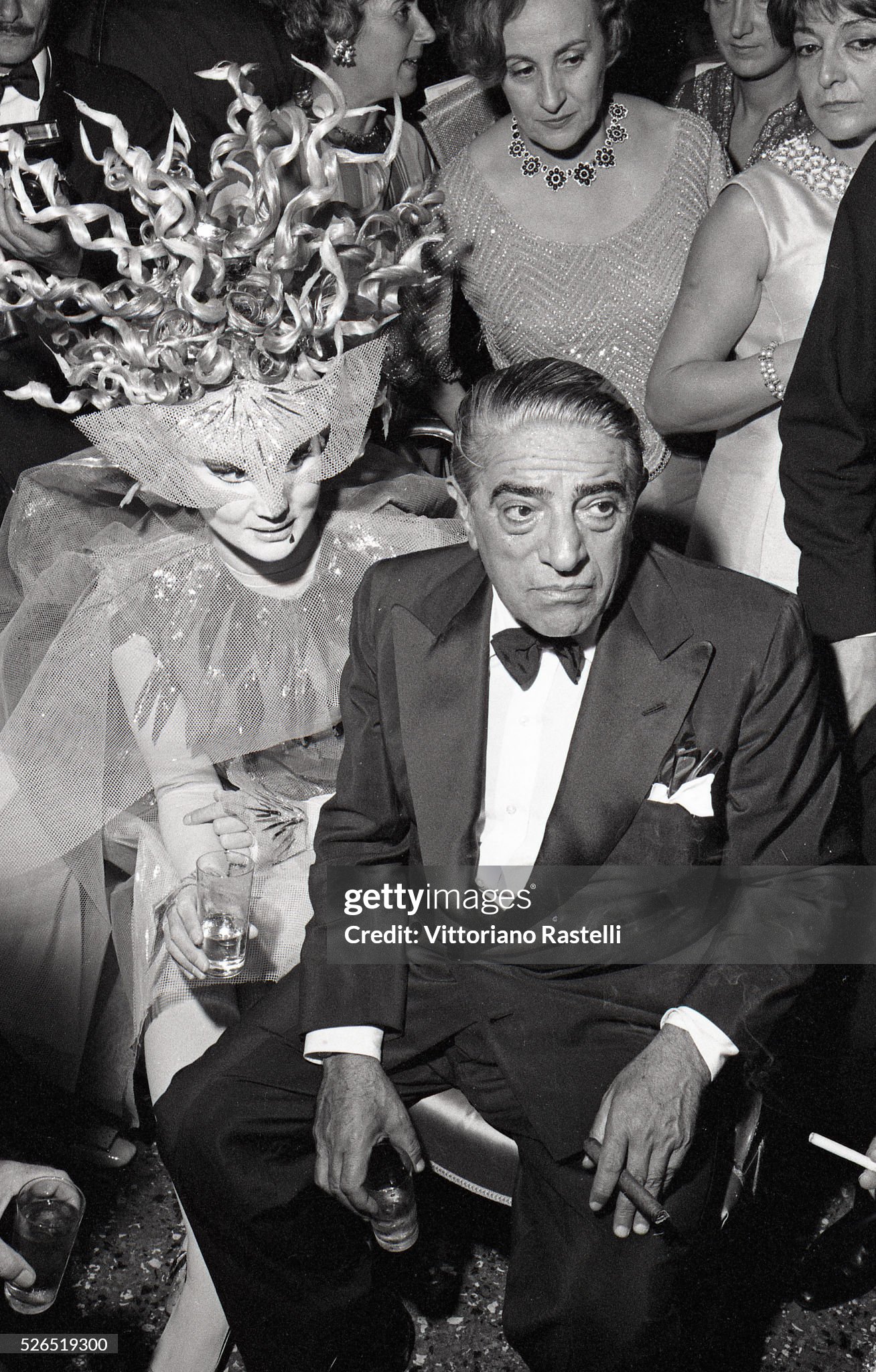 Aristotle Onassis attends a masquerade party at Ca' Rezzonico Palace in Venice on September 1967. 