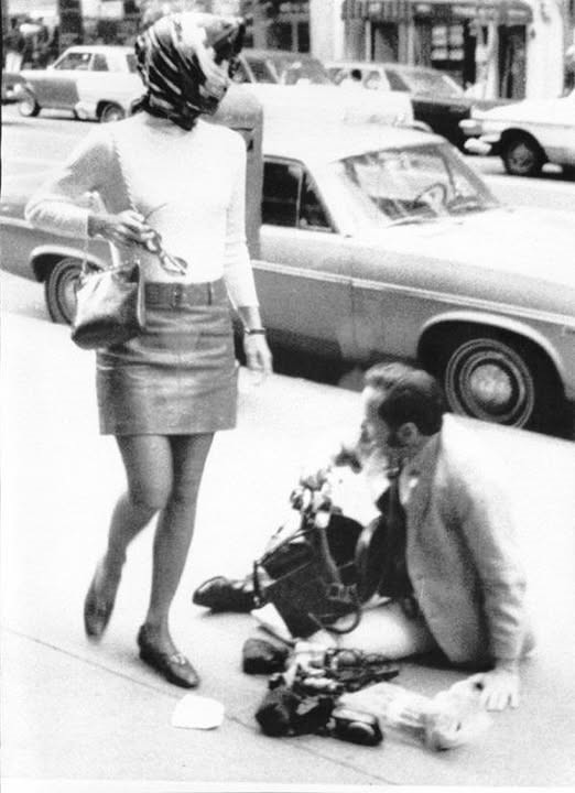 Jackie Kennedy Onassis walks out of Cinema Rendezvous Theatre after seeing ‘I am curious yellow’. 