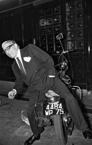 Aristotle Onassis on a bike in Paris in 1970.