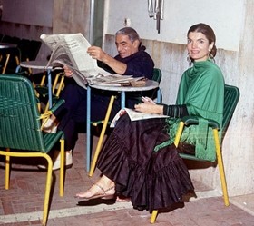 Ari and Jackie Onassis snapped at a cafe.