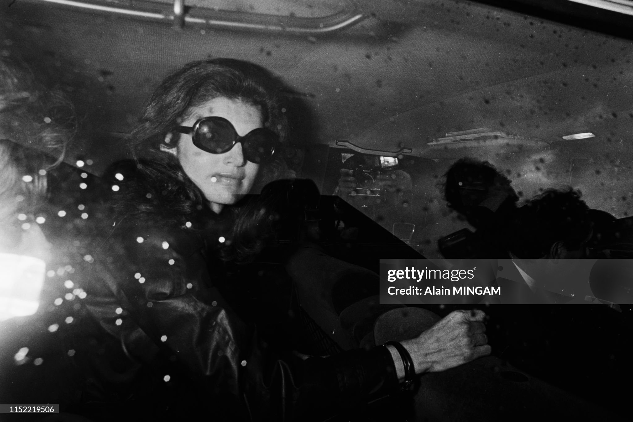 Jacqueline Kennedy Onassis leaves the American Hospital of Paris in Neuilly-sur-Seine after the death of her husband Aristotle Onassis on March 16, 1975. 