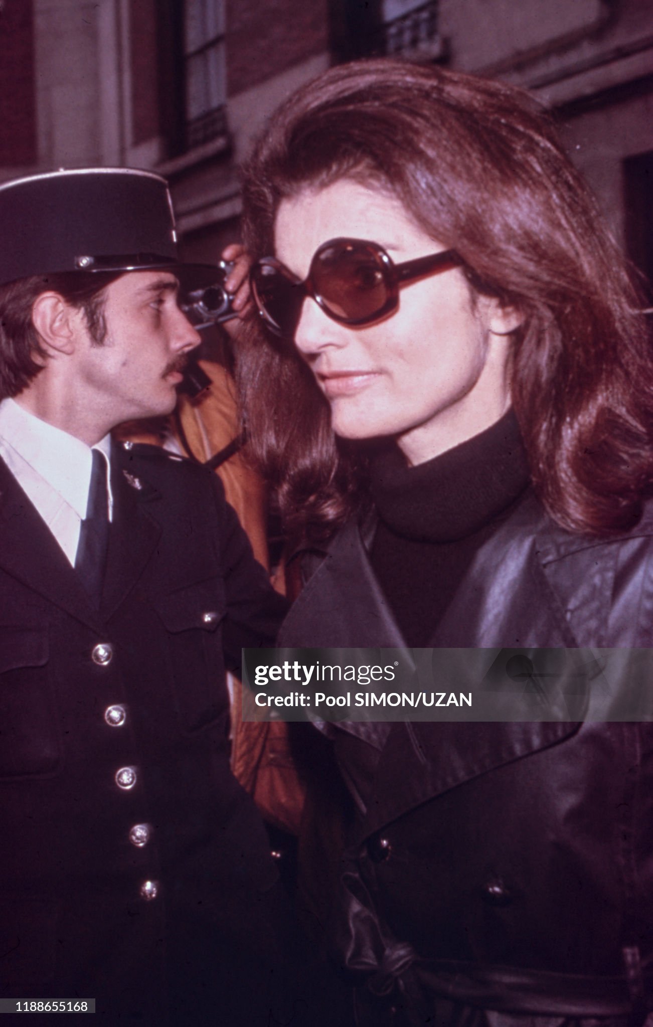 Jackie Kennedy returns to her Parisian home on Avenue Foch after the funeral of her husband Aristotle Onassis in Paris on 18 March 1975. 