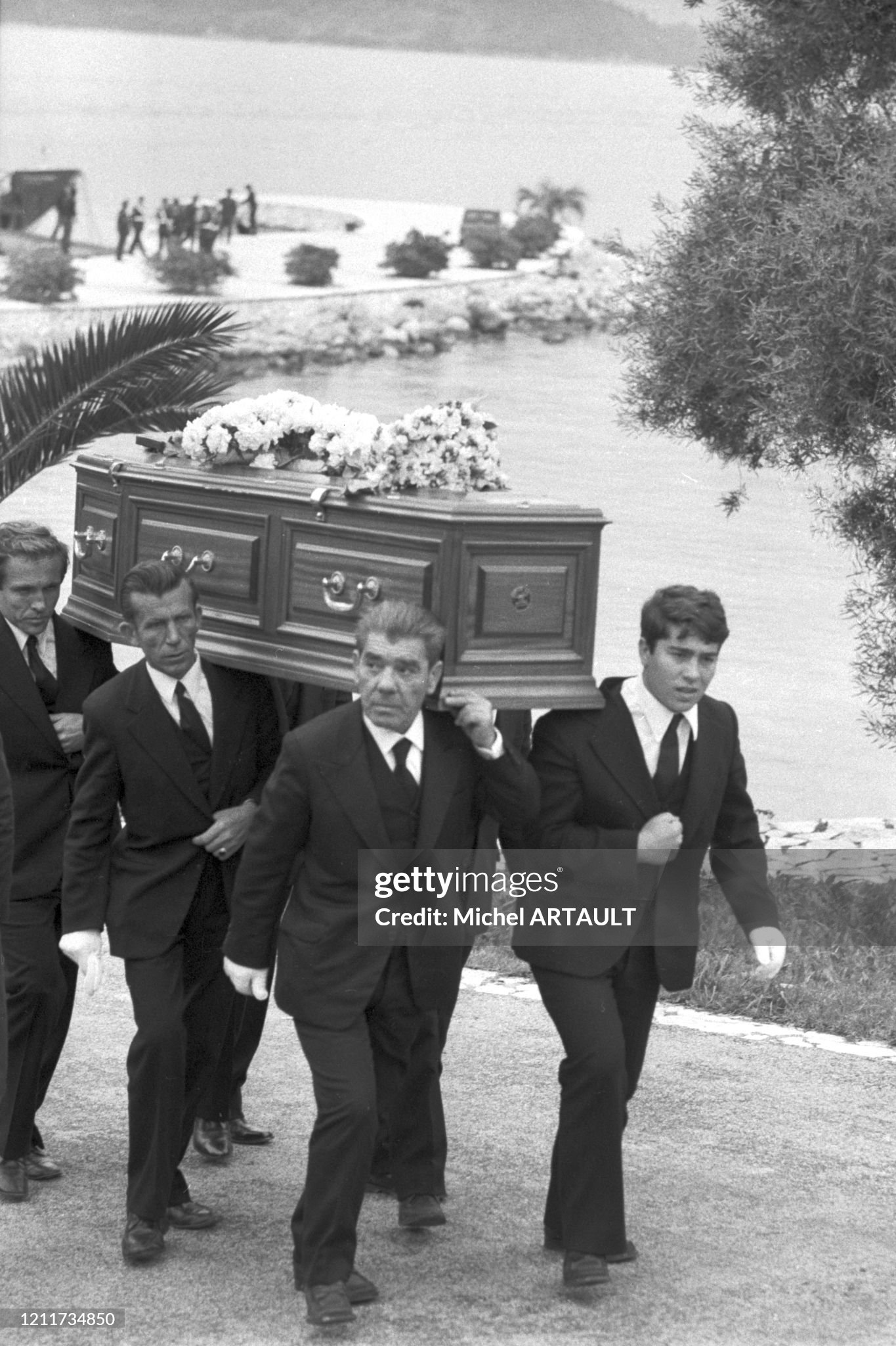 Men carry the coffin of Greek shipping magnate Aristotle Onassis during his funeral on the island of Skorpios on 18 March 1975, in Greece. 