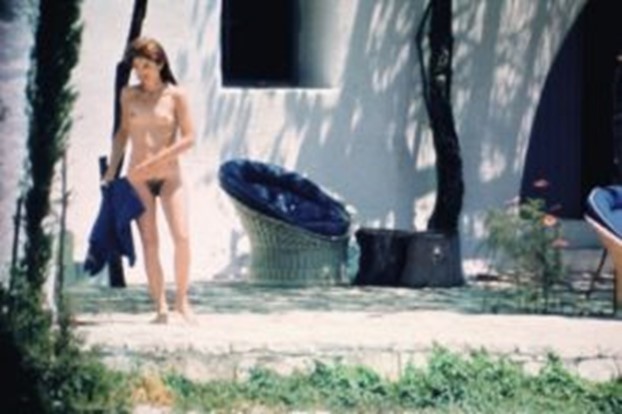 Among the dozen or so images snapped of her sunbathing without her suit on Skorpios, the former First Lady had this one cropped and blown up as a poster, signing it as a gift for Andy Warhol.