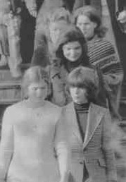 Jackie Kennedy Onassis and her children emerge from a 10th anniversary memorial mass to President Kennedy at St. Bridget’s Catholic Church in New Jersey. 
