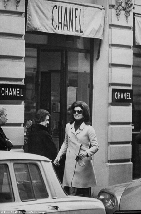 Jackie Onassis exiting Chanel in Paris.