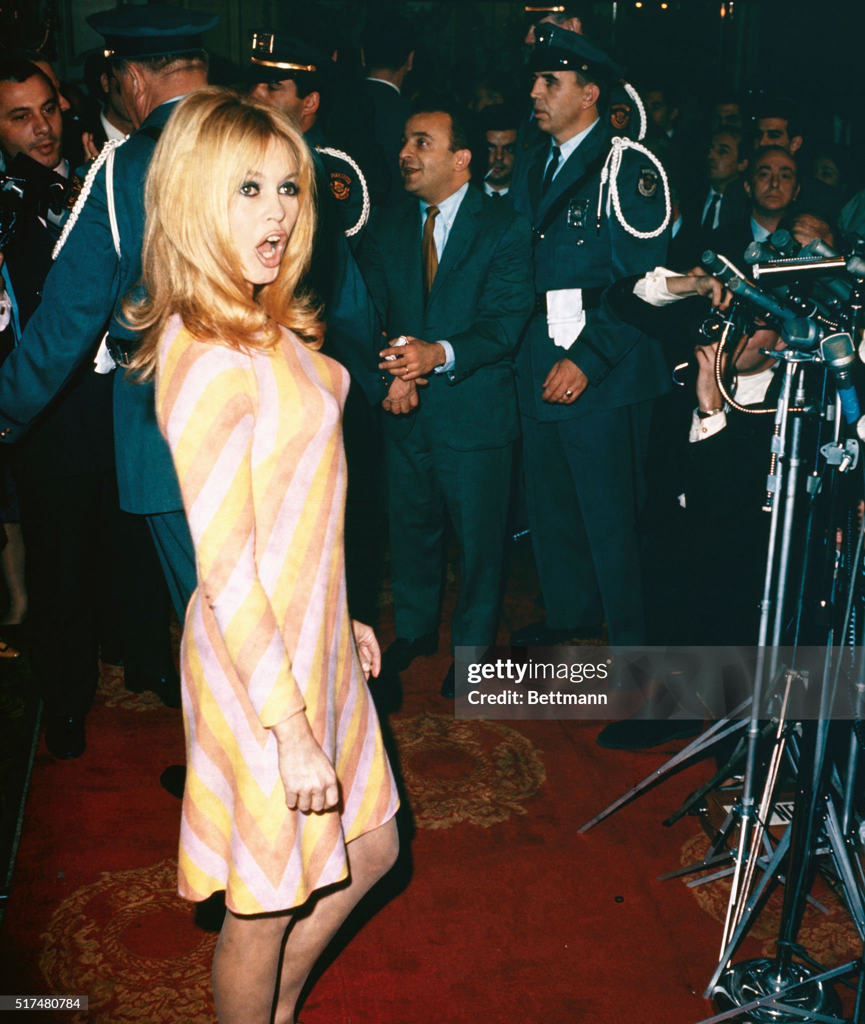 Brigitte Bardot poses for photographers during her only formal press conference at the Plaza Hotel on 17 December 1965. 