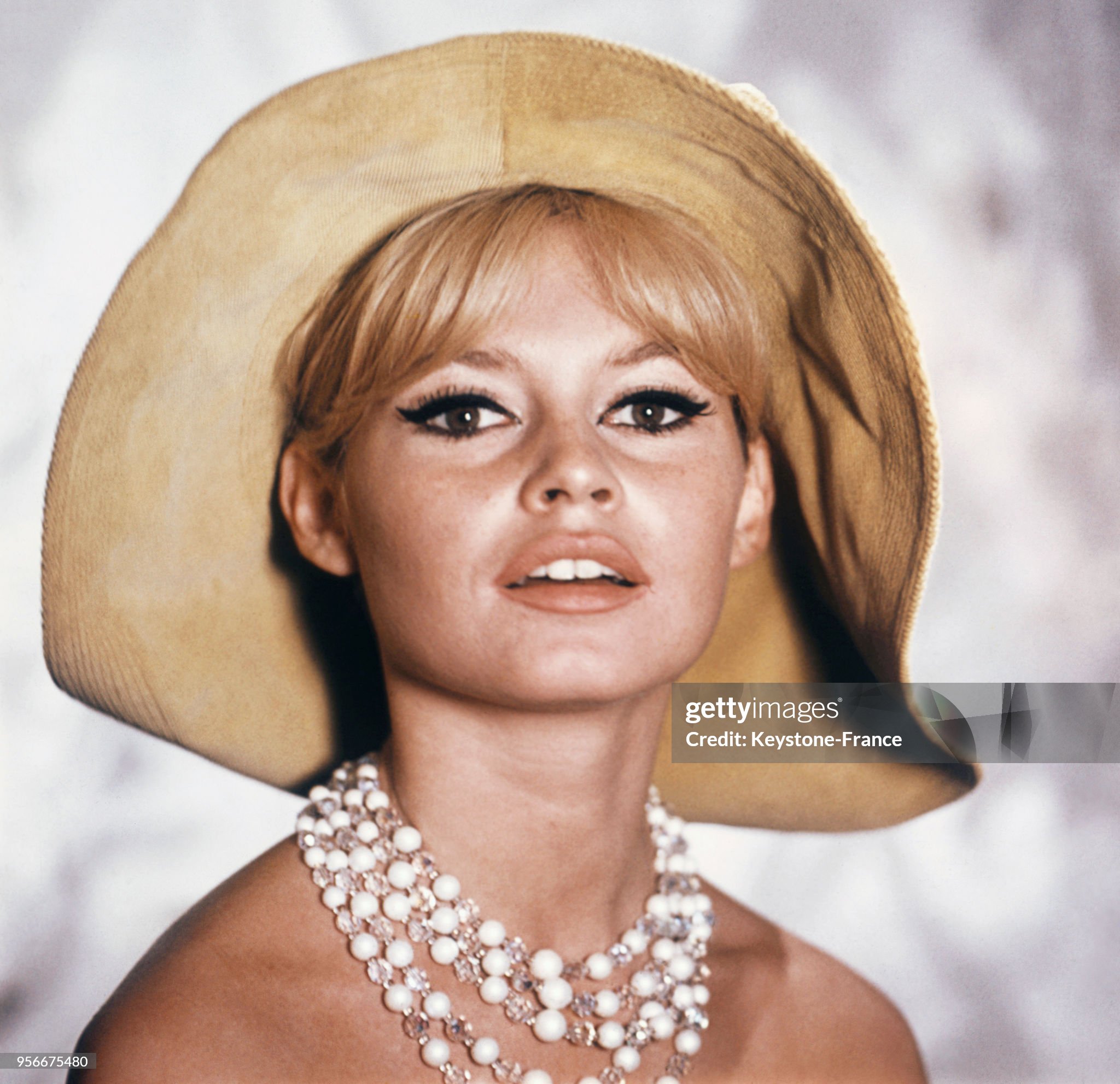 Brigitte Bardot at a hat collection presentation in Paris, France, in 1966. 