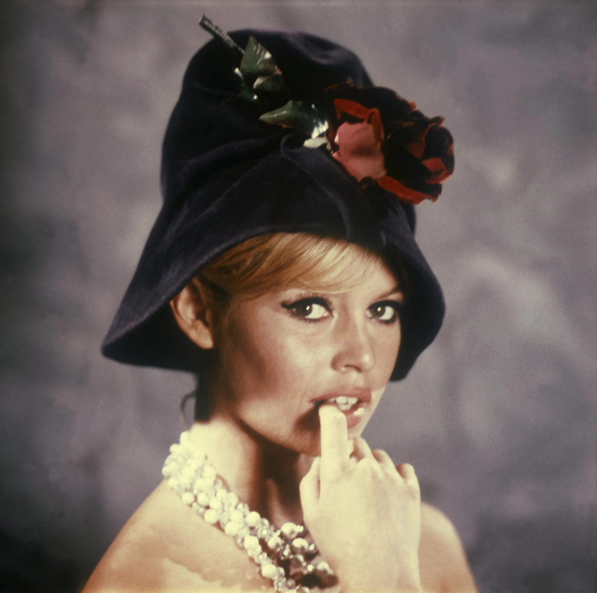 Brigitte Bardot at a hat collection presentation in 1966.