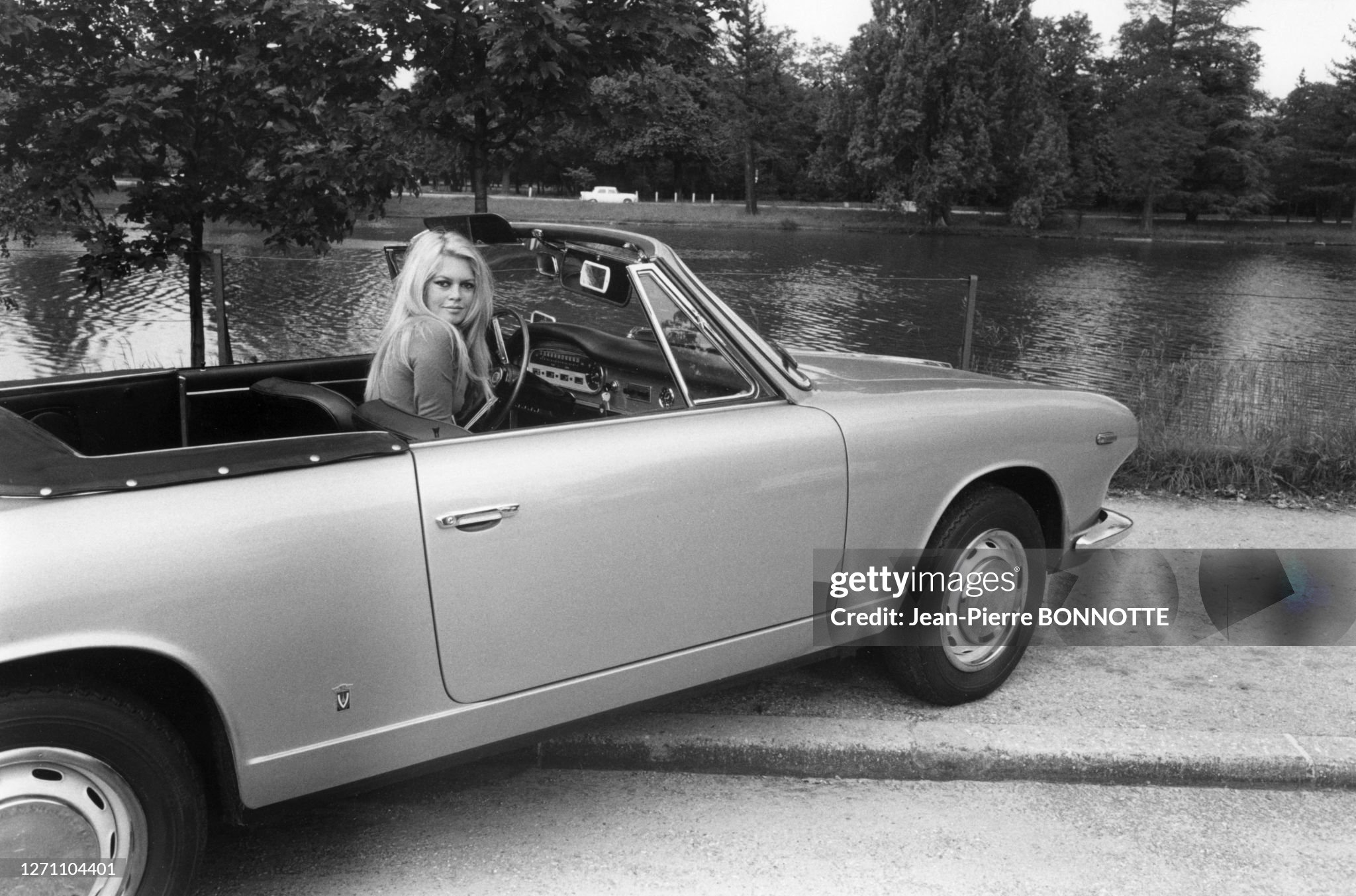 Brigitte Bardot in her 'Lancia Flavia' cabriolet in 1967. 