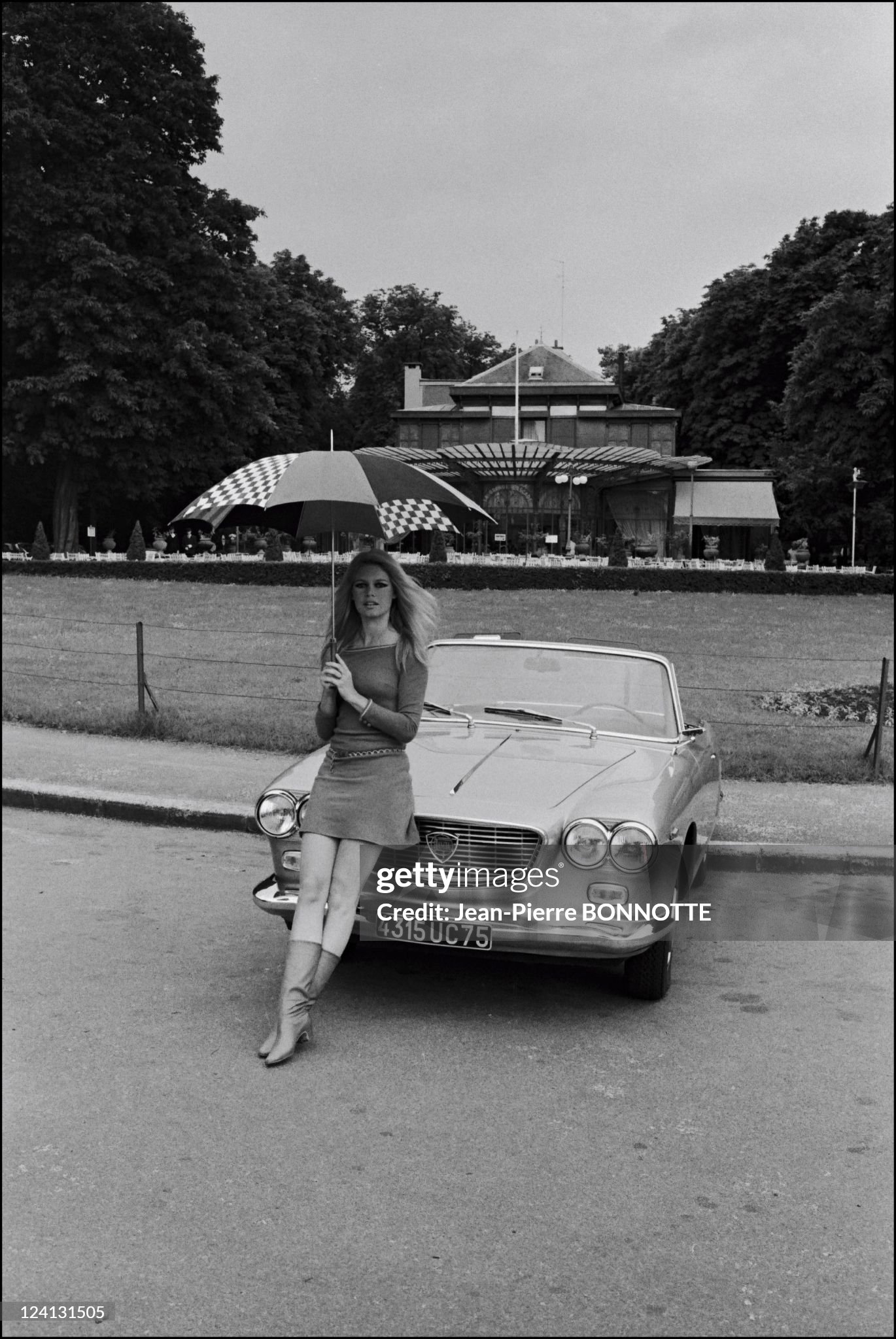 Brigitte Bardot and her 'Lancia Flavia' cabriolet in 1967. 