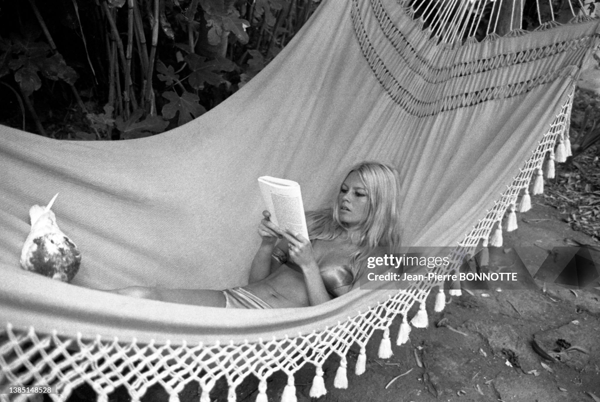 Brigitte Bardot in a hammock at her home in La Madrague, Saint-Tropez, in August 1967. 