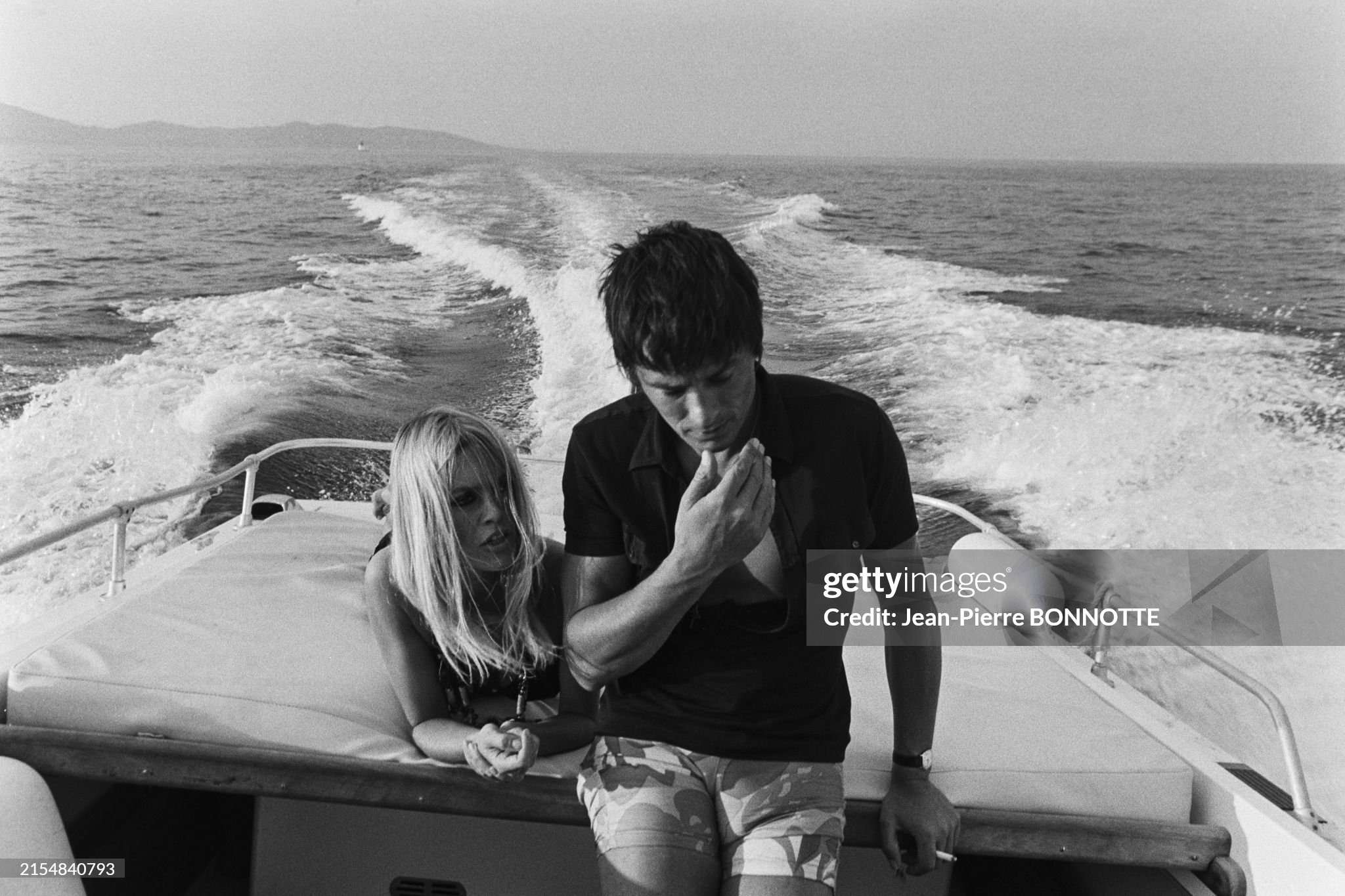 Brigitte Bardot and Alain Delon on a boat off the coast of Saint-Tropez on 01 August 1968. 
