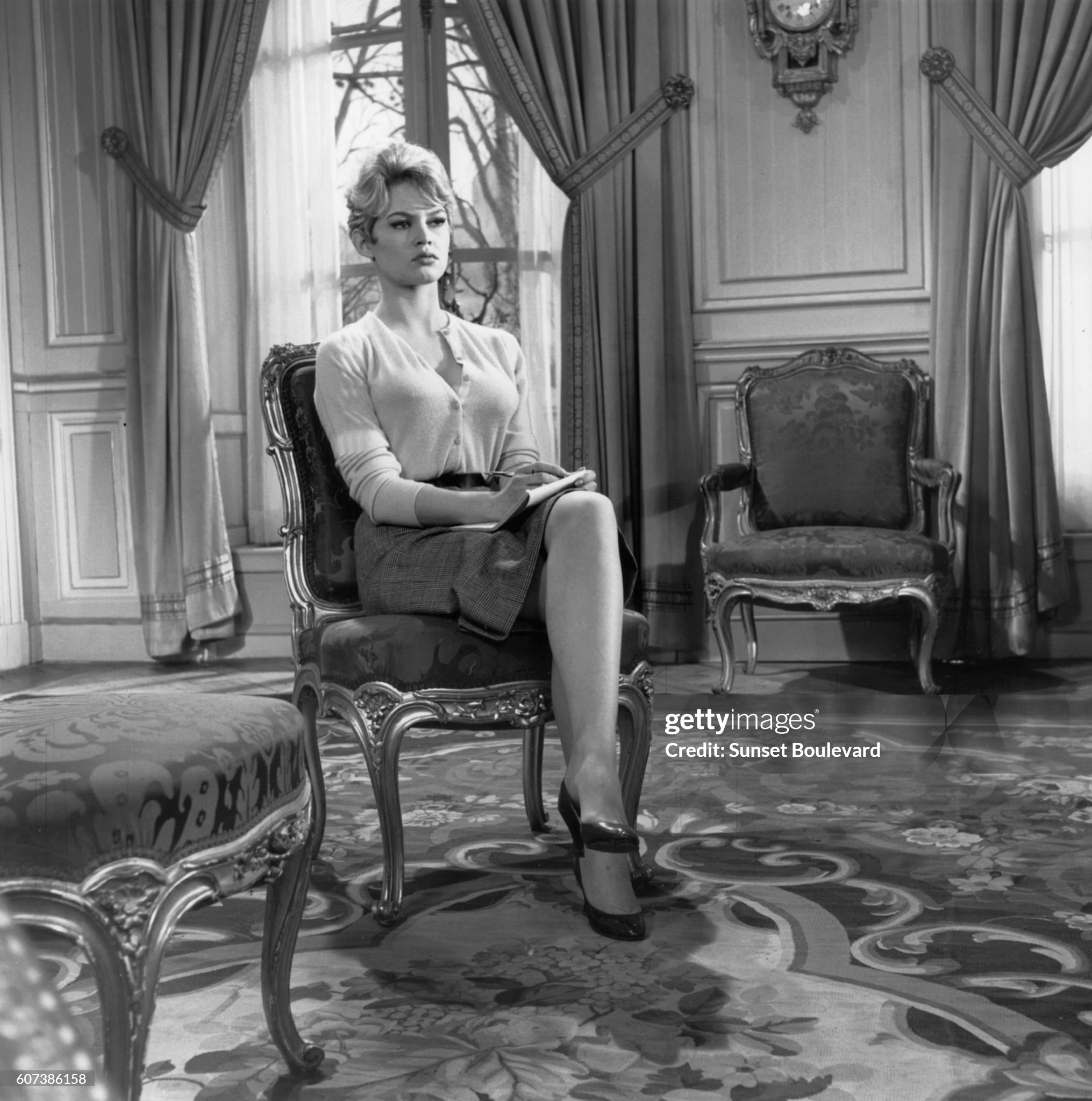 Brigitte Bardot on the set of 'La Parisienne' by Michel Boisrond in 1957. 