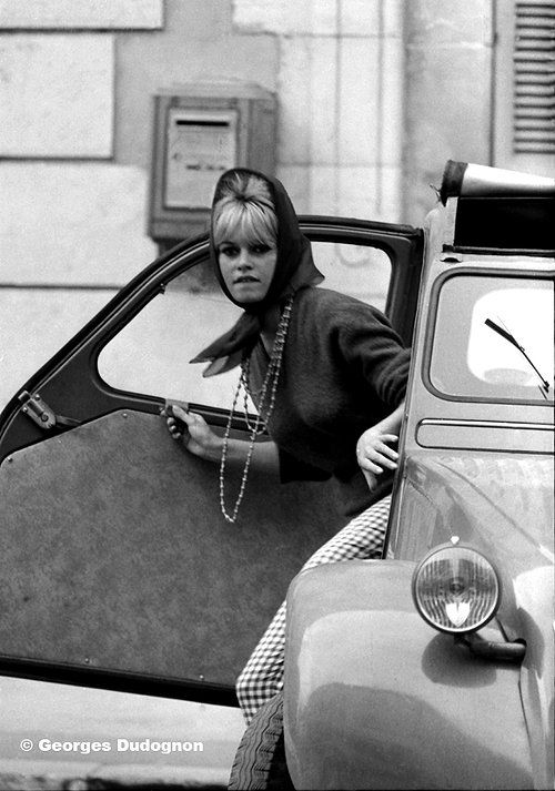 Brigitte Bardot at Saint-Tropez in a Citroën 2 CV in 1958.