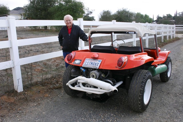 Bruce Meyers with his red Manx.