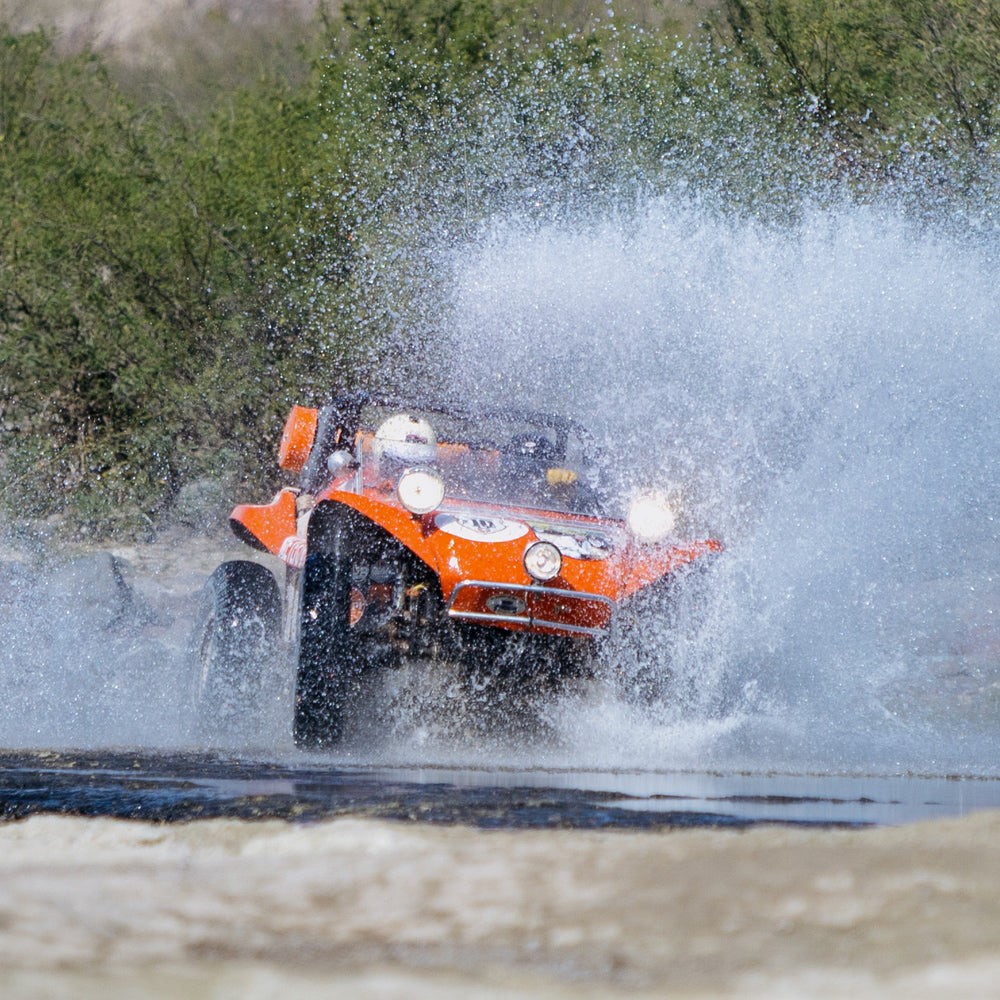 Jagger Meyers washing the Baja dirt off his freshly built car, 2024.