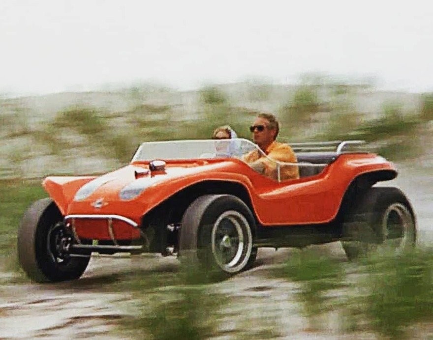 Steve McQueen in a Dune Buggy.