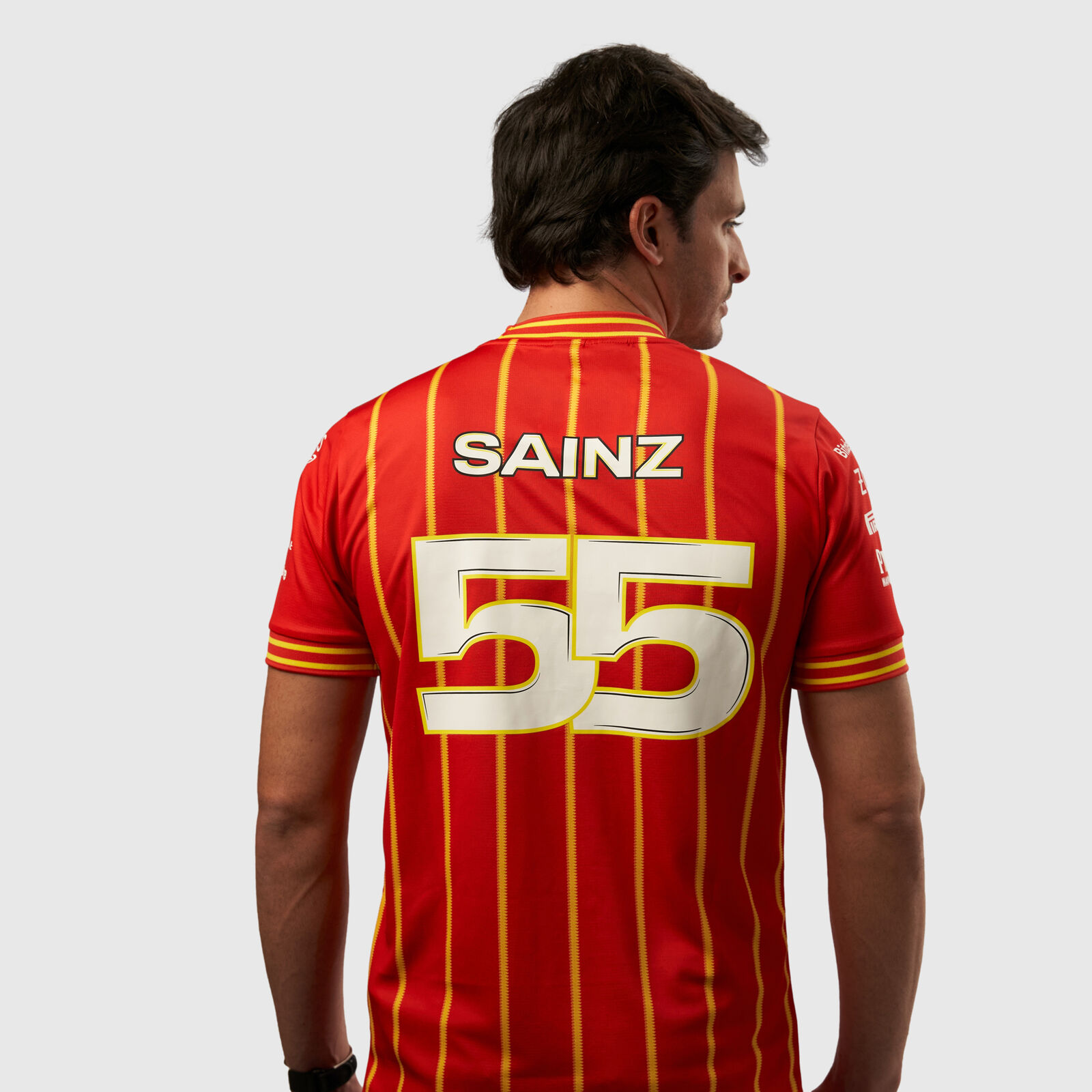 Carlos Sainz with his Ferrari soccer jersey.