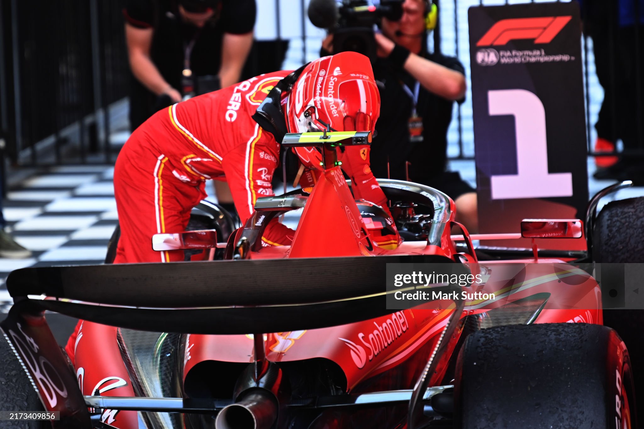 Charles Leclerc, Scuderia Ferrari, 2nd position, congratulates Carlos Sainz, Scuderia Ferrari, 1st position, at arrival in Parc Ferme after the Australian Grand Prix at Melbourne Grand Prix Circuit on Sunday March 24, 2024. 