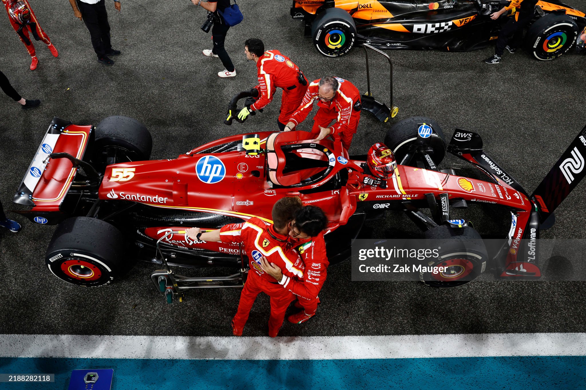 Carlos Sainz, Ferrari SF-24, 2nd position, celebrates with his team after the F1 Grand Prix of Abu Dhabi at Yas Marina Circuit on 08 December 2024 in Abu Dhabi, United Arab Emirates. 