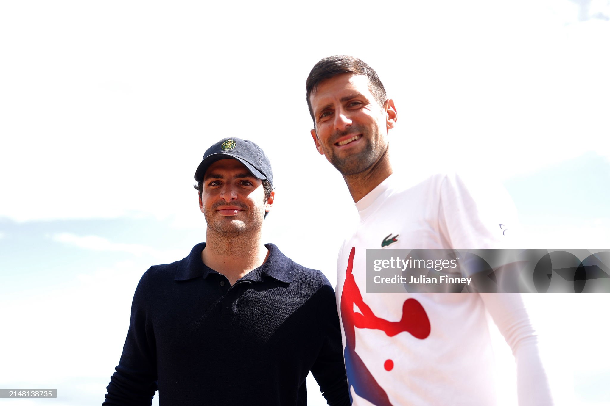 Carlos Sainz and tennis player Novak Djokovic pose for a photo on day four of the Monte Carlo Masters at Monte-Carlo Country Club on April 10, 2024. 