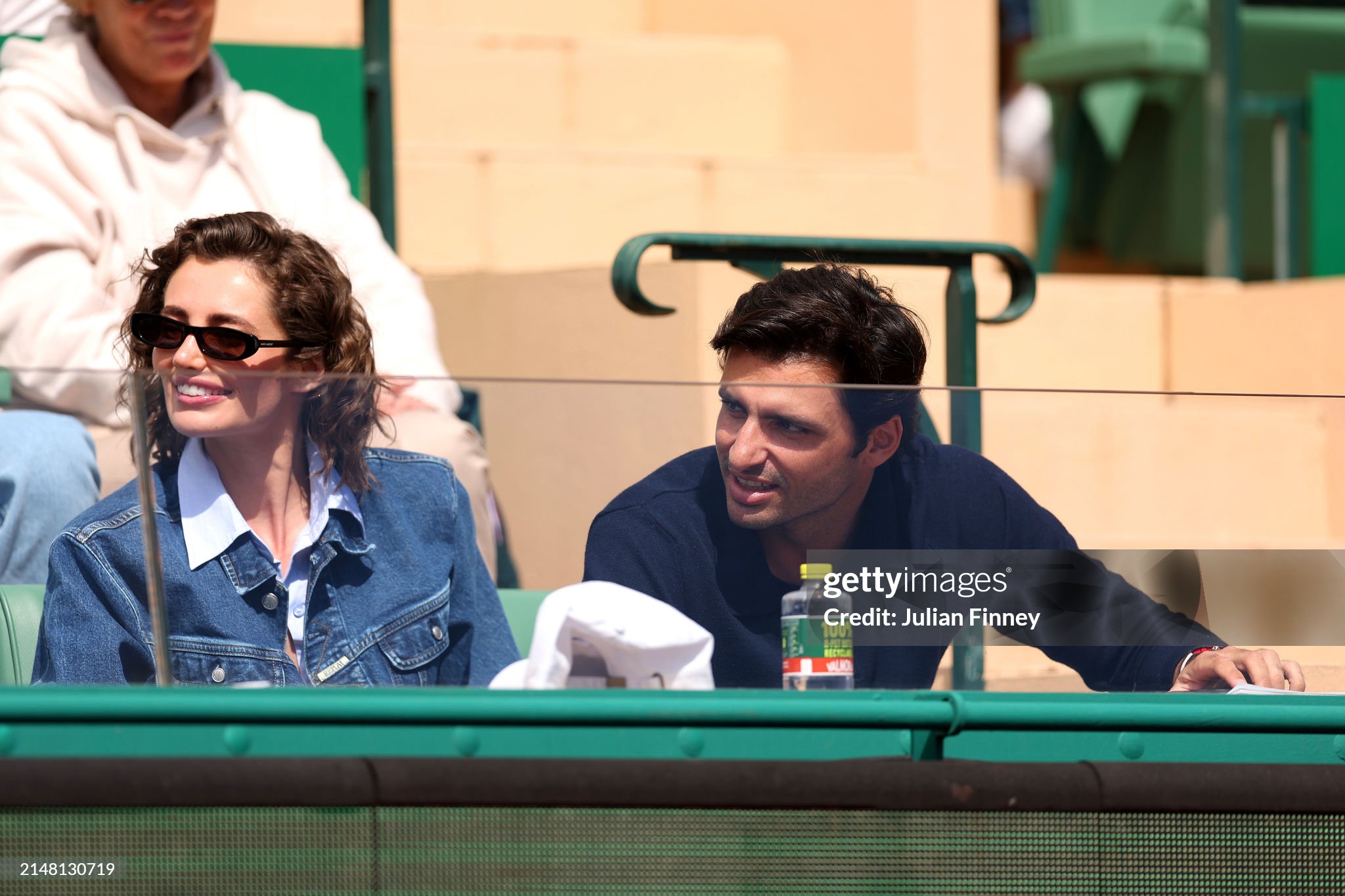 Carlos Sainz with his girlfriend Rebecca Donaldson during the men's singles second round match between Alexei Popyrin and Andrey Rublev at the Monte Carlo Masters at Monte Carlo Country Club on April 10, 2024. 