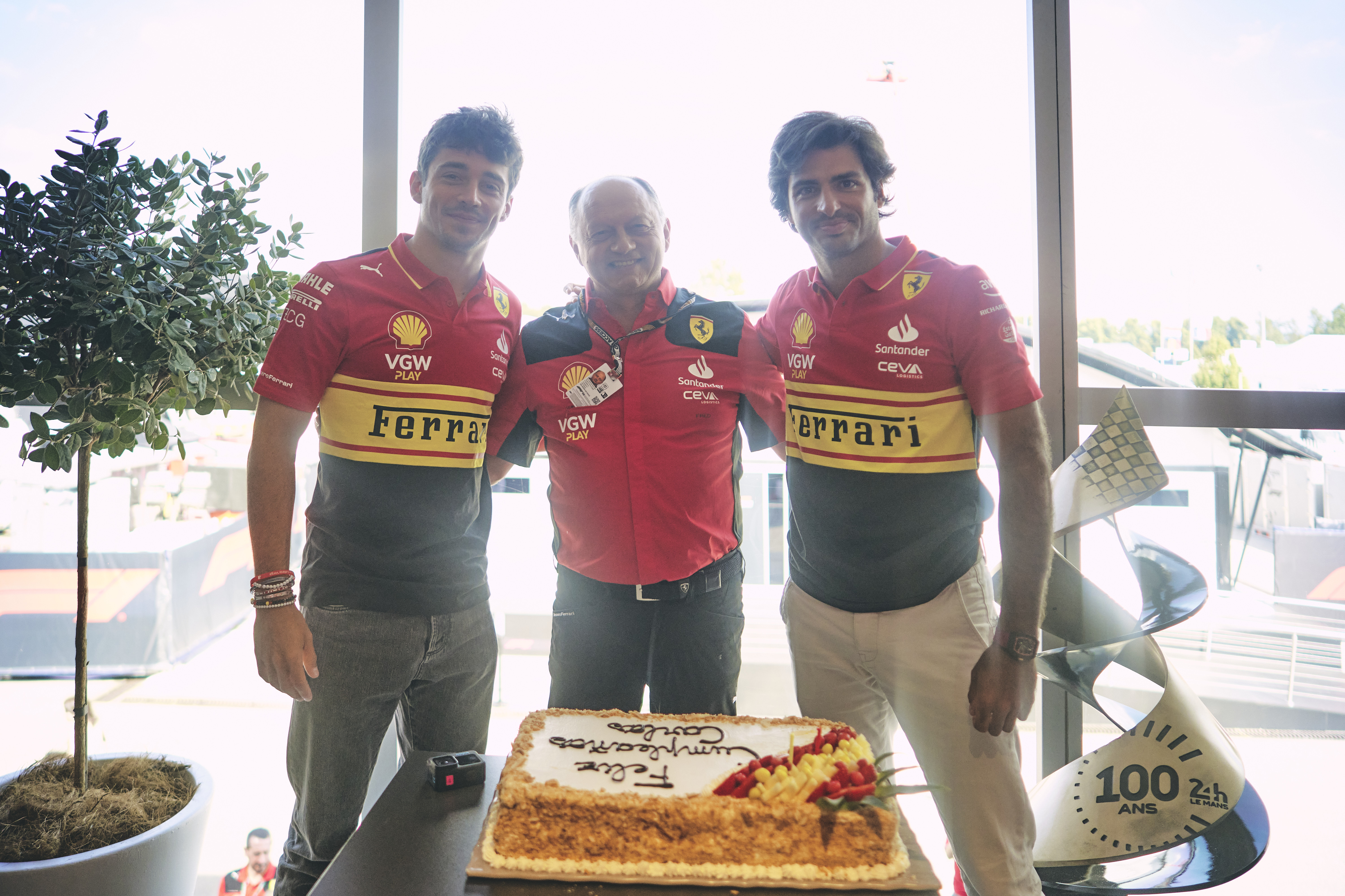 Frederic Vasseur with Carlos Sainz and Charles Leclerc at the 2023 Monza Grand Prix. 