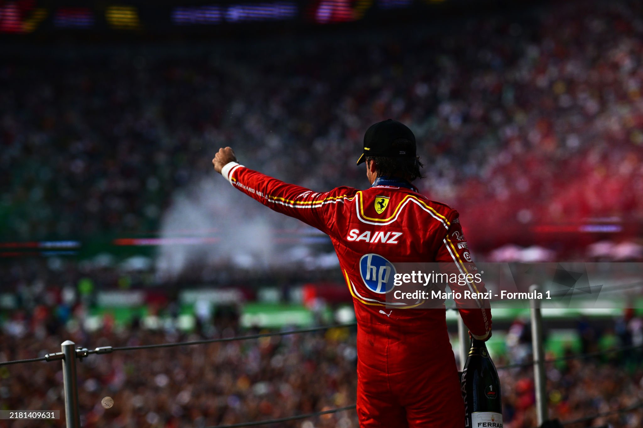 Race winner Carlos Sainz celebrates on the podium after the F1 Grand Prix of Mexico at Autodromo Hermanos Rodriguez in Mexico City, Mexico, on October 27, 2024. 