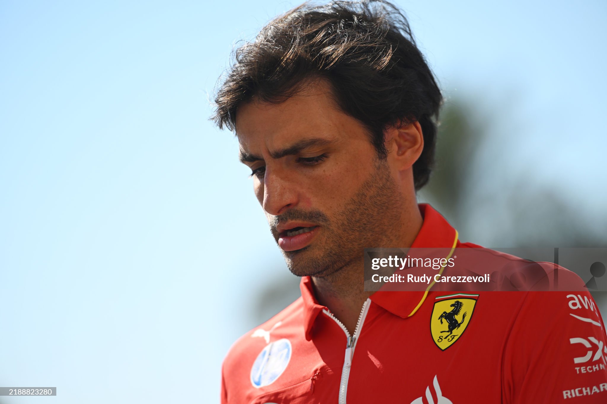 Carlos Sainz walks in the paddock prior to the F1 Grand Prix of Abu Dhabi at Yas Marina Circuit on December 08, 2024. 