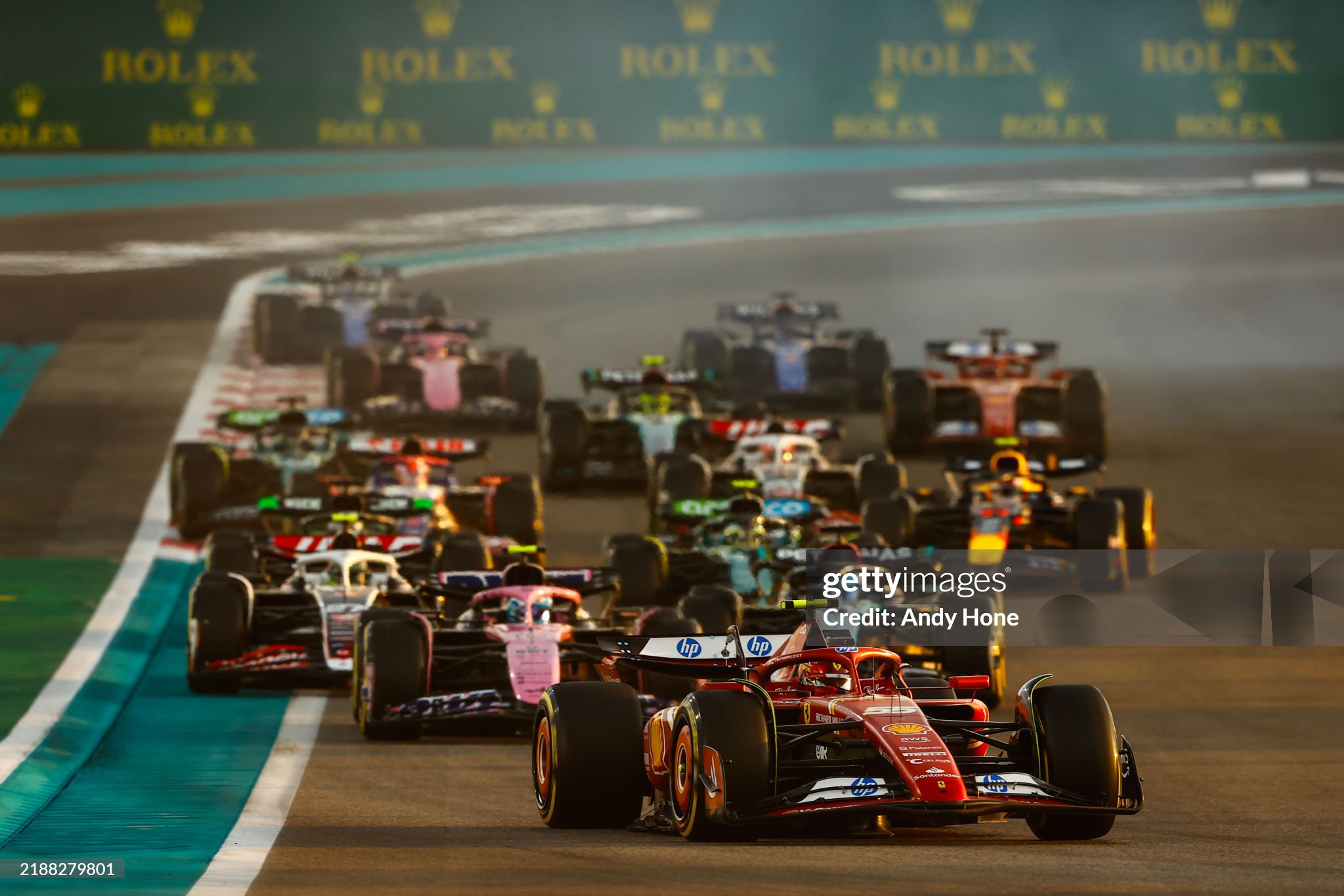 Carlos Sainz, Ferrari SF-24, leads Pierre Gasly, Alpine A524, George Russell, Mercedes F1 W15, Nico Hulkenberg, Haas VF-24, Fernando Alonso, Aston Martin AMR24 and the remainder of the field during the F1 Grand Prix of Abu Dhabi at Yas Marina Circuit on 08 December 2024 in Abu Dhabi, United Arab Emirates. 