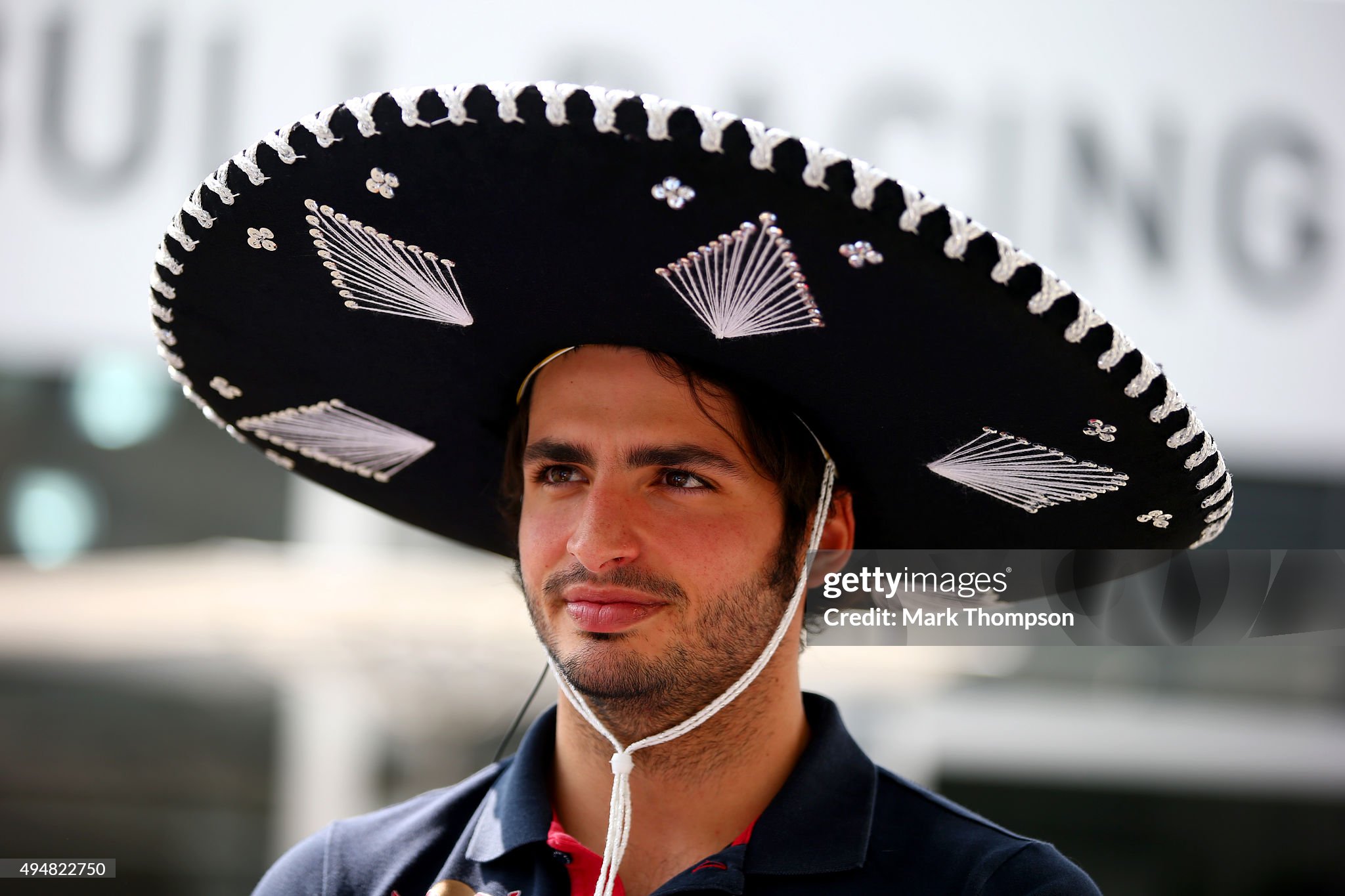 Carlos Sainz of Spain and Scuderia Toro Rosso wears a sombrero as he walks in the paddock during previews to the Formula One Grand Prix of Mexico at Autodromo Hermanos Rodriguez on October 29, 2015 in Mexico City, Mexico. 