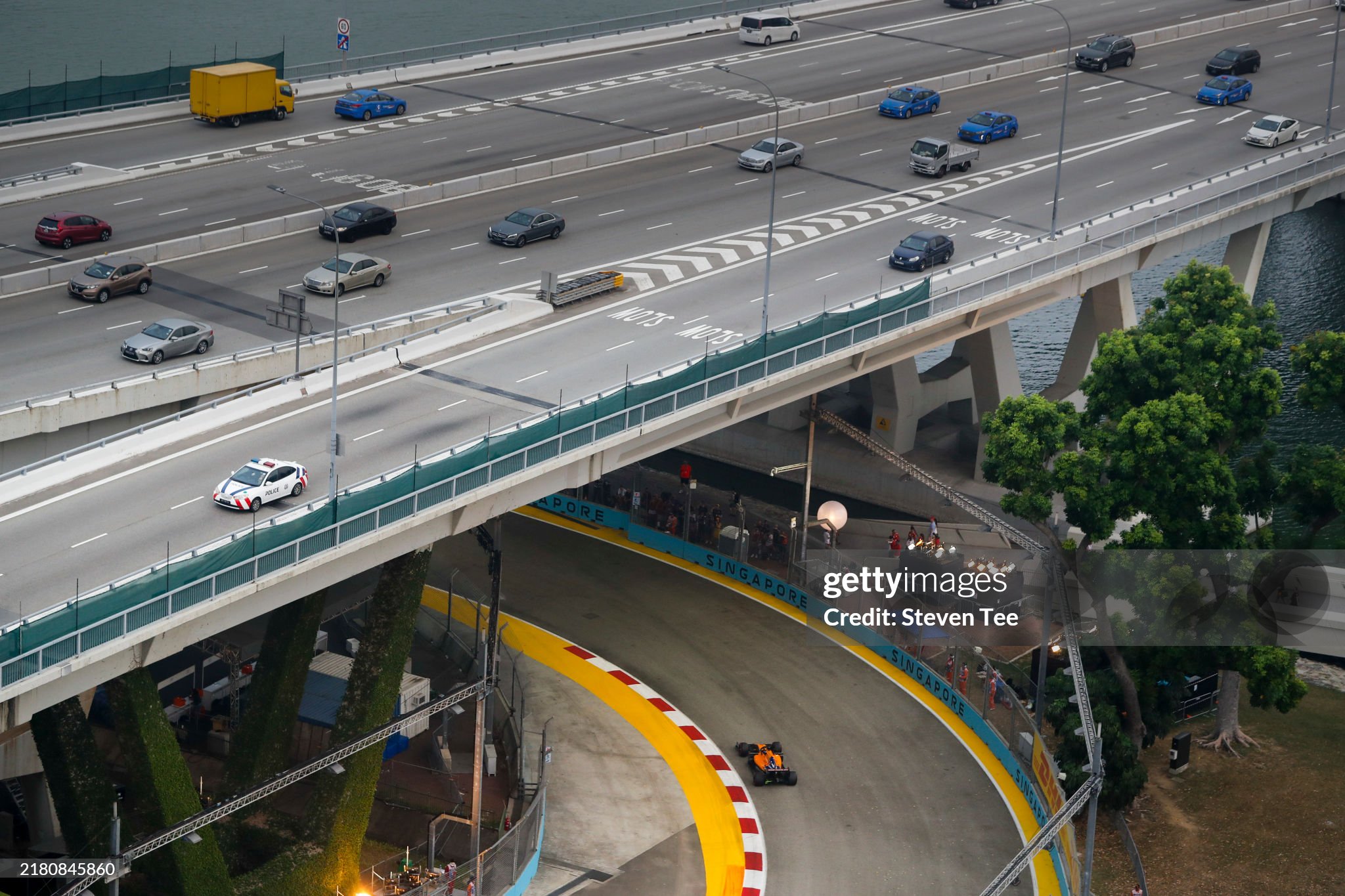 Carlos Sainz Jr., McLaren MCL34, passes under the city road network during the Singapore Grand Prix at Singapore Street Circuit on September 20, 2019. 